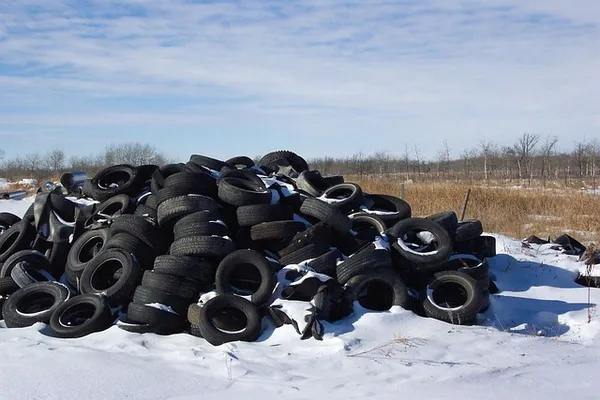 Pile of used tires at a landfill facility