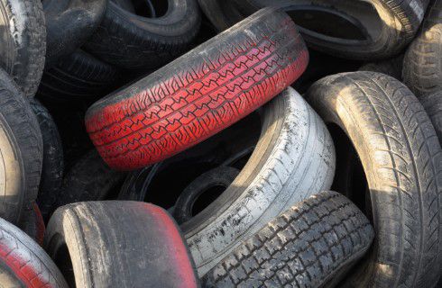 Red tires at a garbage dump